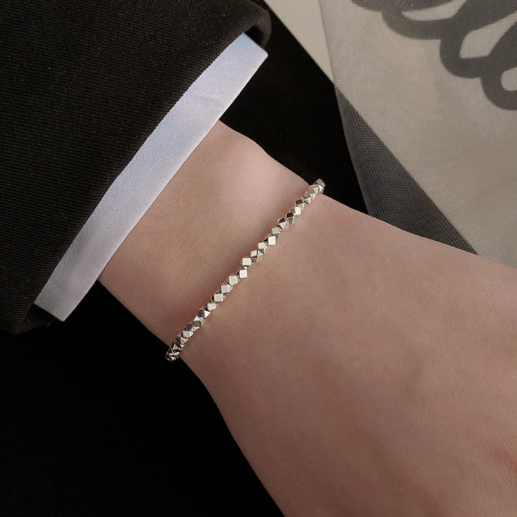 Broken silver bracelet