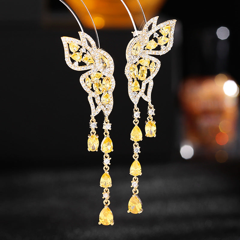 Butterfly water drop fringed earrings